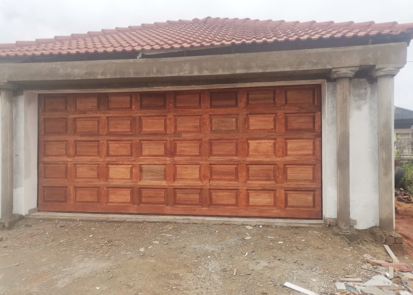 Double Wooden Slatted Panel Door - A warm, natural finish that adds charm and elegance.